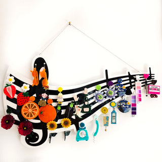 Musical staff earring holder