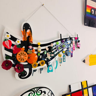 Musical staff earring holder